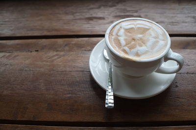 Coffee cup on table