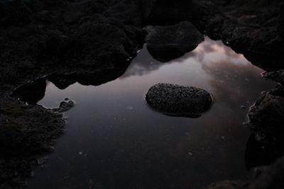 High angle view of rock formation in lake