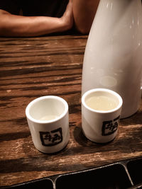 Close-up of coffee cup on table