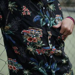 Midsection of woman holding christmas decorations