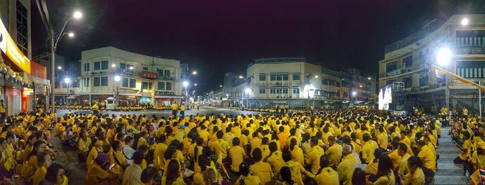 Group of people in city at night