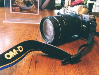 Close-up of camera on table