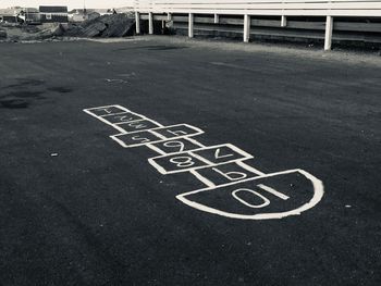 High angle view of bicycle sign on road