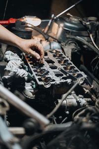 Cropped hand of man working at workshop