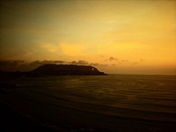 Scenic view of sea at sunset