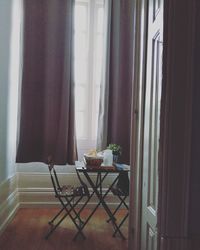 Potted plants on table at home