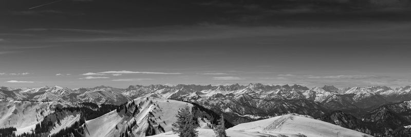 Panoramic view of snowcapped mountains against sky