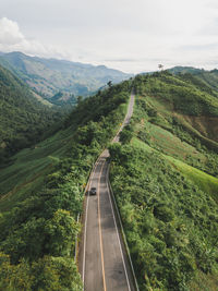 High angle view of road amidst landscape against sky