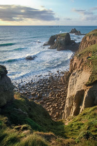 Scenic view of sea against cloudy sky