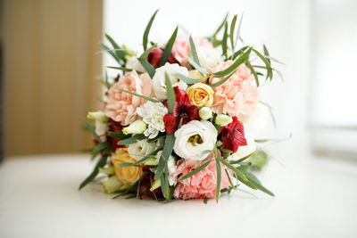 Close-up of rose bouquet on table