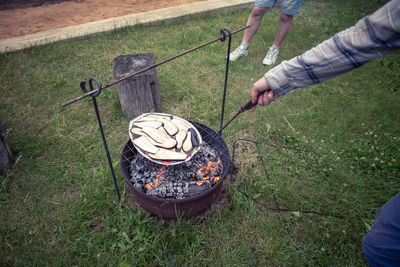 High angle view of man preparing food