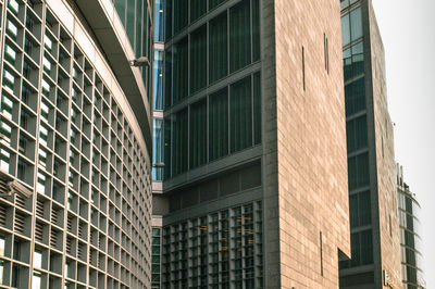 Low angle view of modern buildings in city