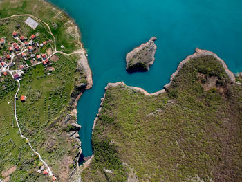 High angle view of rocks by sea