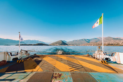 View of the stern of a tourist boat as it crosses lake maggiore