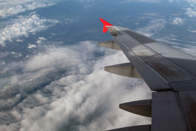 Low angle view of airplane flying in sky