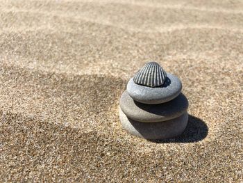 High angle view of stones on sand