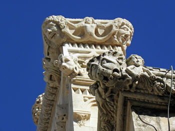 Low angle view of statue against clear sky