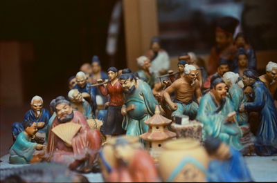 Close-up of figurines on table