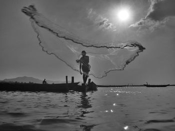 Reflection of people in water