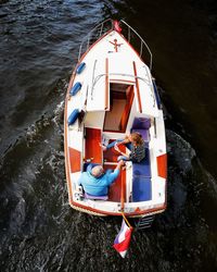 High angle view of boat moored on river