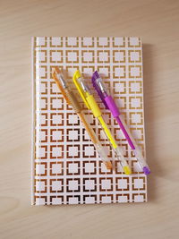 High angle view of multi colored pencils on table