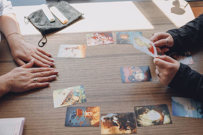 High angle view of people on table