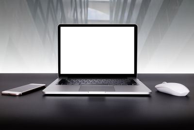 Low angle view of laptop on table