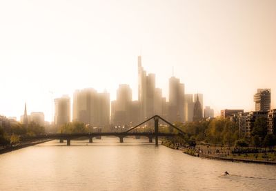 View of skyscrapers in city against clear sky