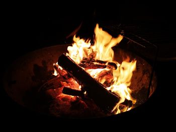 Close-up of burning fire in the dark