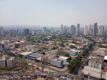 High angle view of buildings against sky in city