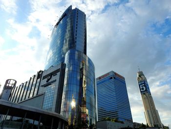 Low angle view of skyscrapers against sky