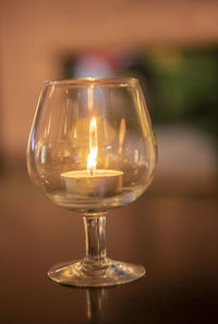 Close-up of wineglass on table