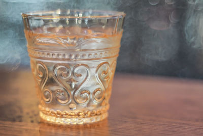 Close-up of glass on table