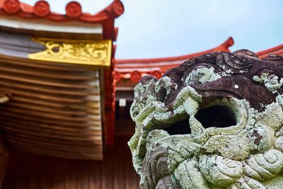 Close-up of shrine statue