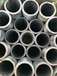 Full frame shot of stacked pipes