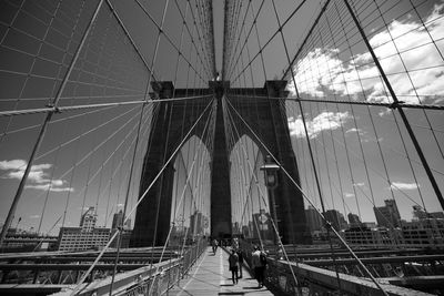 People walking on brooklyn bridge