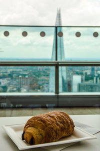 Close-up of food on table against window