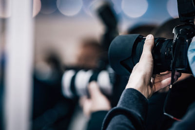 Cameraman recording a media event