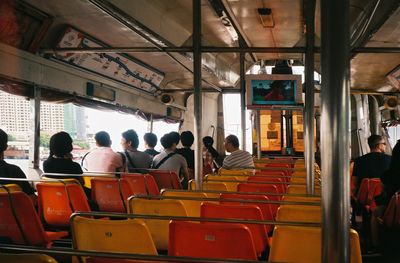 Group of people sitting in bus