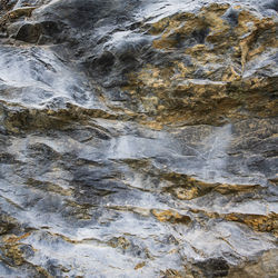 Full frame shot of rocks in water