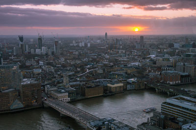 Aerial view of city at sunset