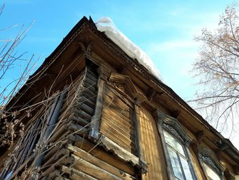 Low angle view of building against blue sky