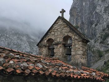 Low angle view of roof against sky