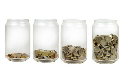 Close-up of bottles against white background