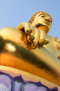 Low angle view of statue against sky