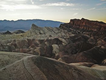 Scenic view of rock formations against sky