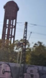 Low angle view of smoke stack against sky