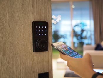 Close-up of hand holding smart phone