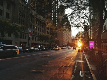 Cars on road in city