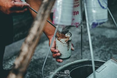 Midsection of person preparing food